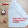 Geschirrtuch das Essen steht im Kochbuch