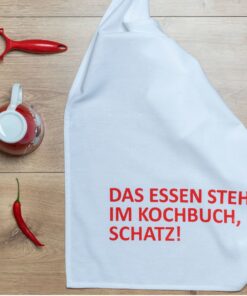 Geschirrtuch das Essen steht im Kochbuch